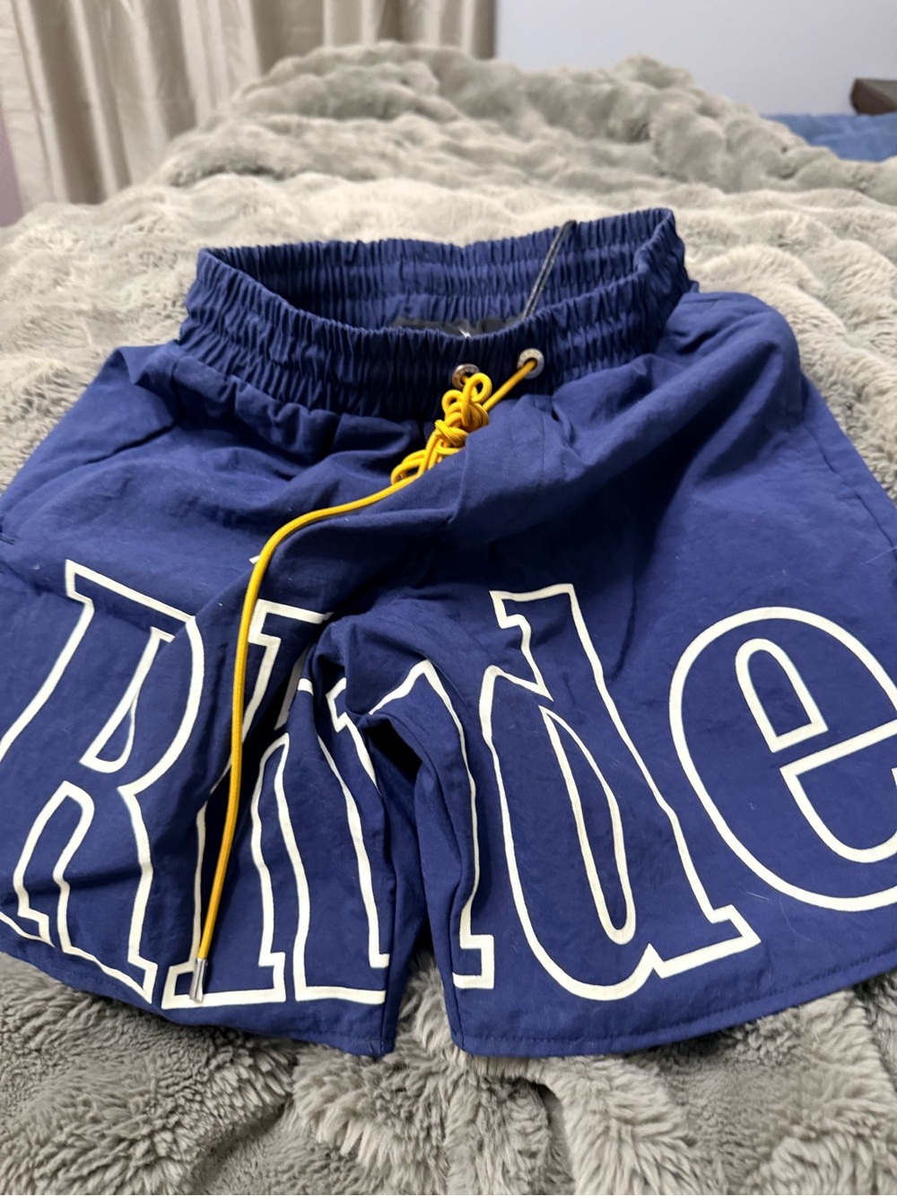 Rhude Navy Blue Athletic Shorts with Yellow Drawstring